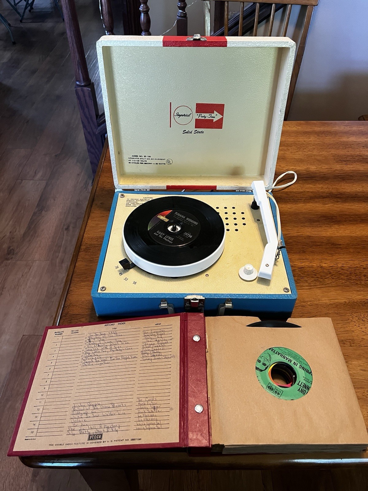 Imperial ED100 Record Player and Sixteen 45 Records