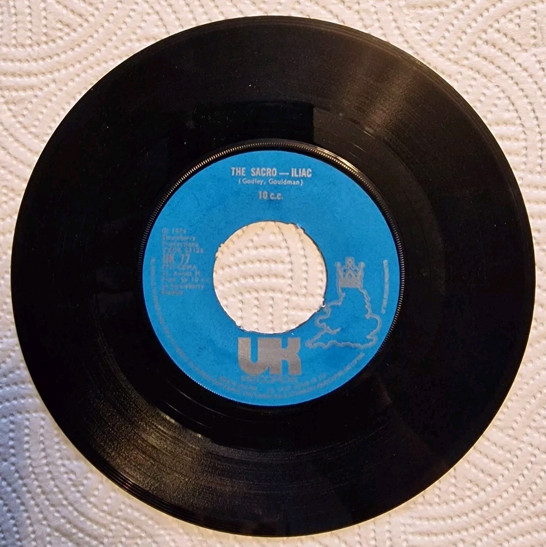 10CC THE SACRO – ILIAC 6/1 (6) 2 Track 7″ Single Plain Paper Sleeve UK RECORDS
