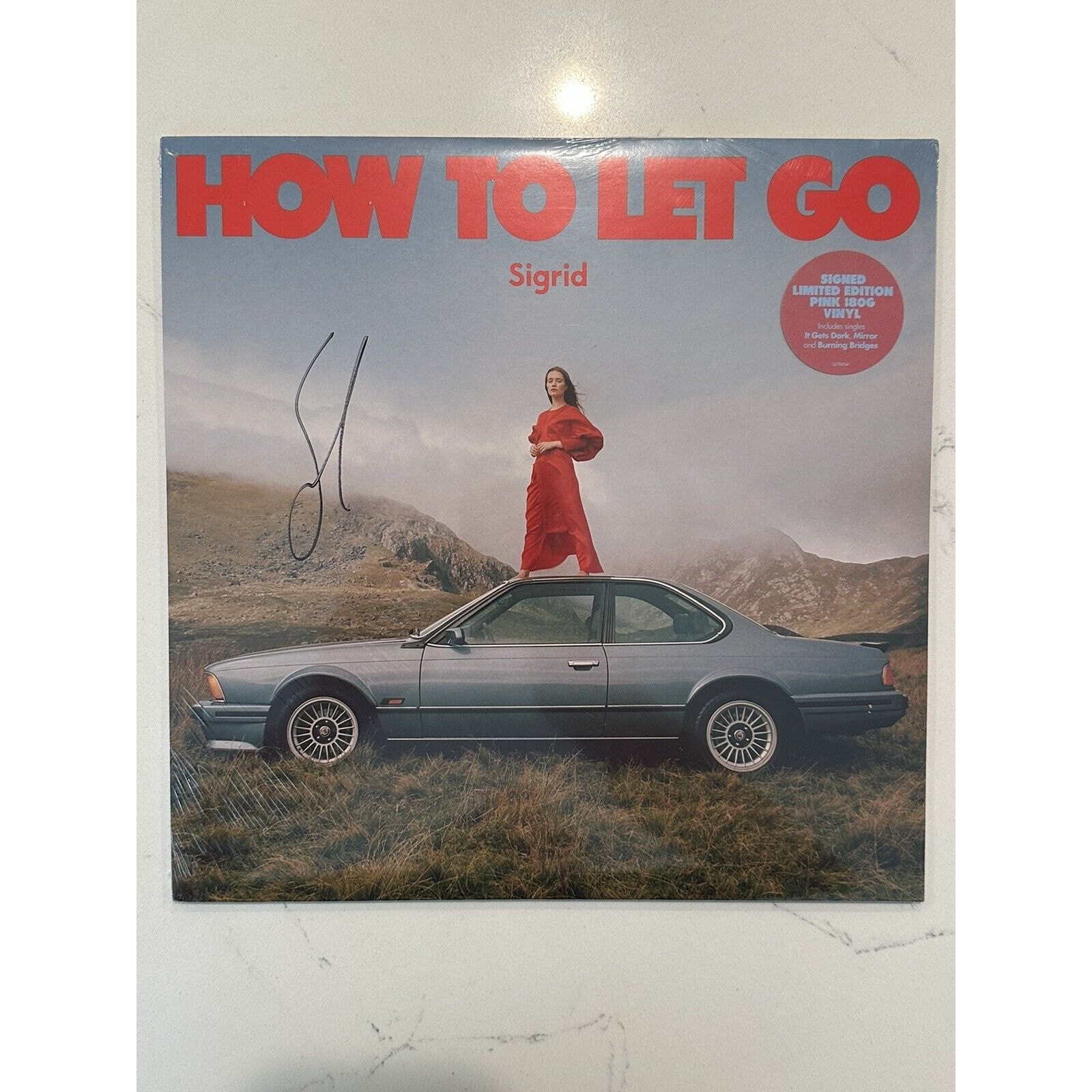 SIGRID – HOW TO LET GO – SIGNED AUTOGRAPHED LIMITED EDITION PINK VINYL LP