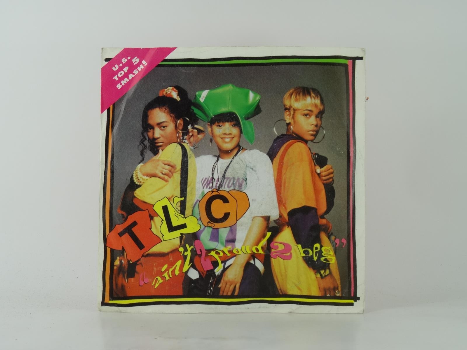 TLC AIN’T PROUD 2 BEG (12) 2 Track 7″ Single including Picture Sleeve LA FACE/AR