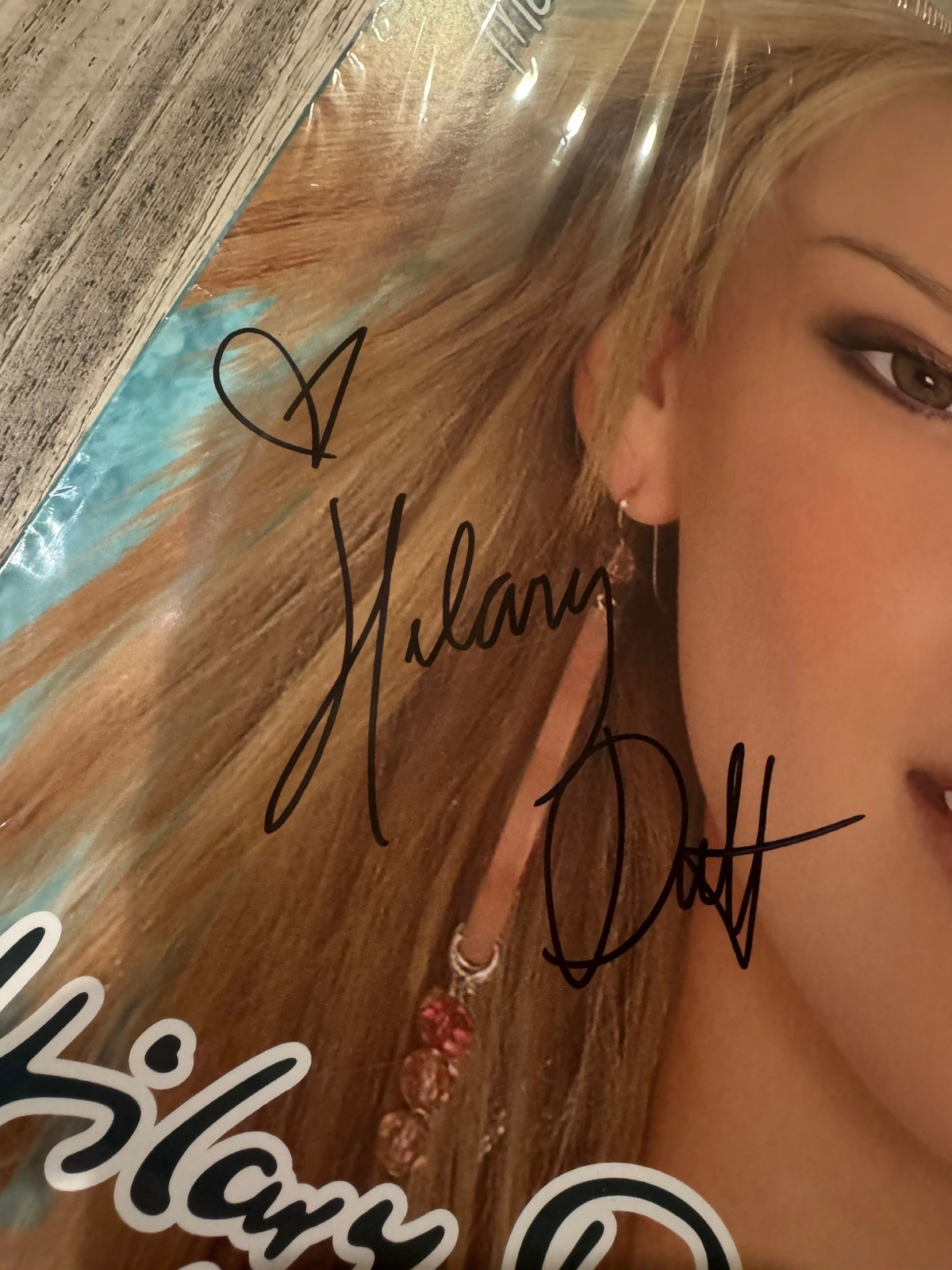 AUTOGRAPHED Metamorphosis (Coke Bottle Clear Vinyl LP) – SIGNED by Hilary Duff