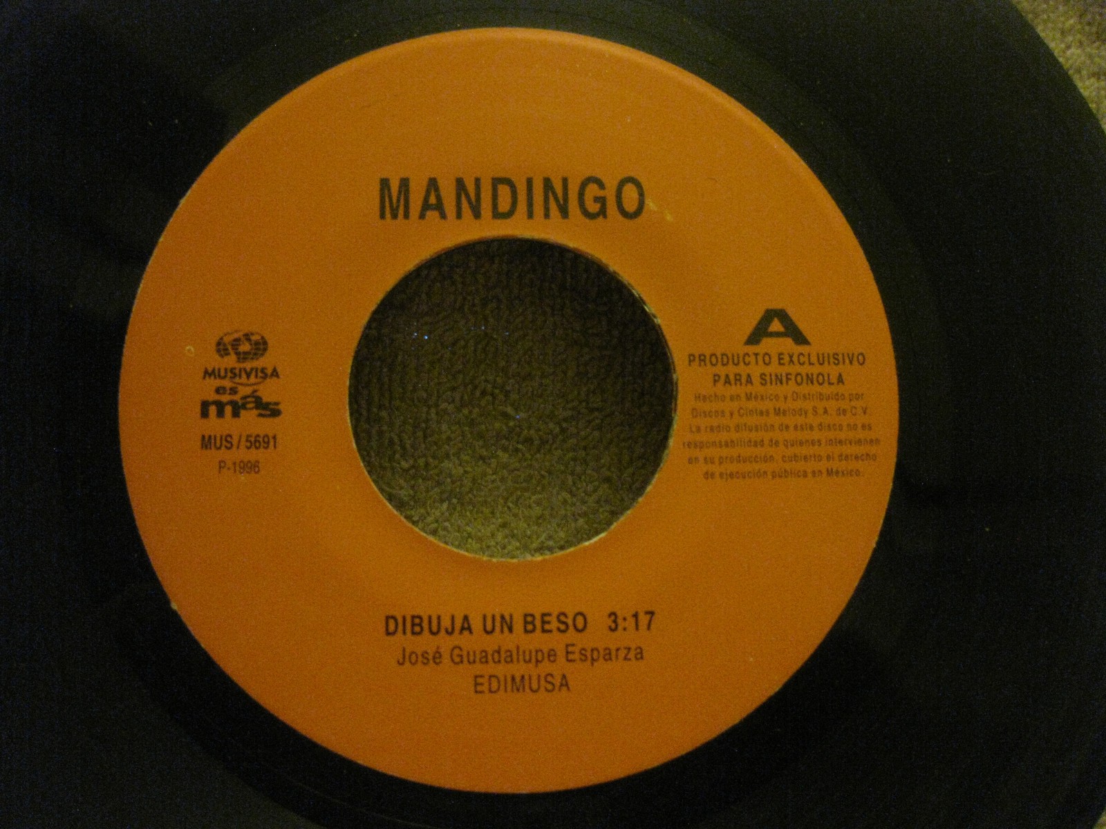 Mandingo – Dibuja Un Beso / Vamos A Amarla Los Dos (1996) Musivisa vinyl 45