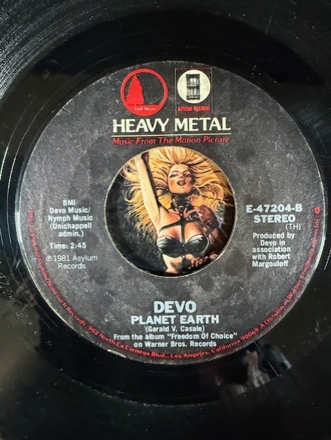DEVO ~ Heavy Metal ~ Working in the Coal Mine/Planet Earth 7″ 45 w P/S G+/G+