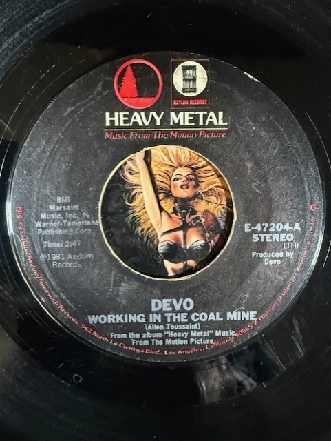 DEVO ~ Heavy Metal ~ Working in the Coal Mine/Planet Earth 7″ 45 w P/S G+/G+