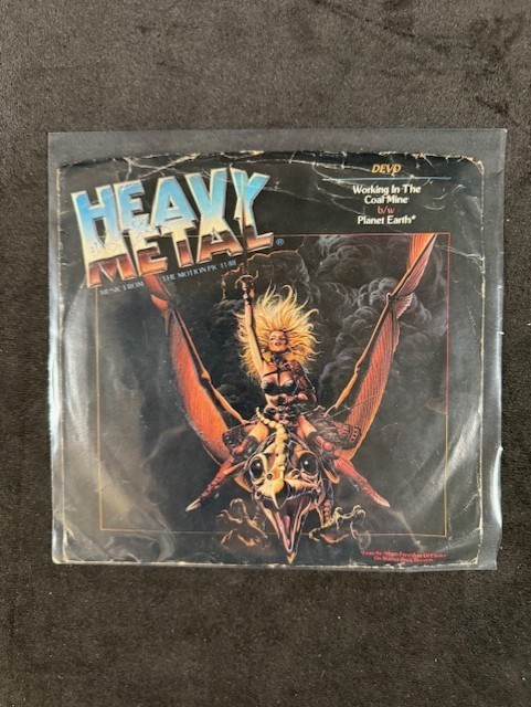 DEVO ~ Heavy Metal ~ Working in the Coal Mine/Planet Earth 7″ 45 w P/S G+/G+