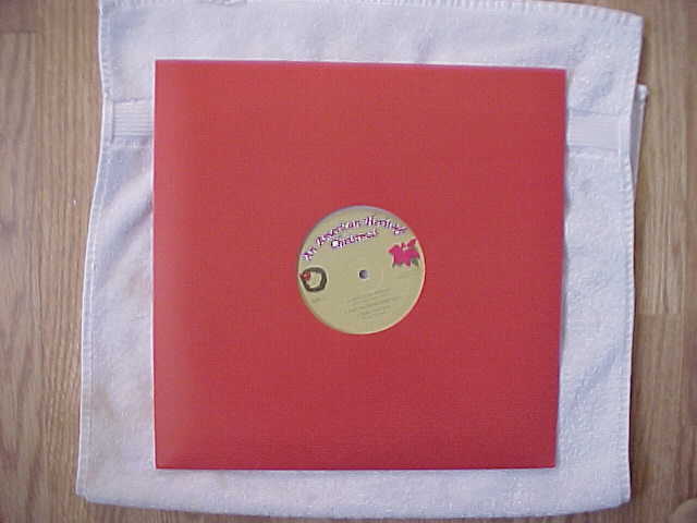 AN AMERICAN HERITAGE CHRISTMAS TWO LP ..BUYER WILL RECEIVE SEALED ALBUMS