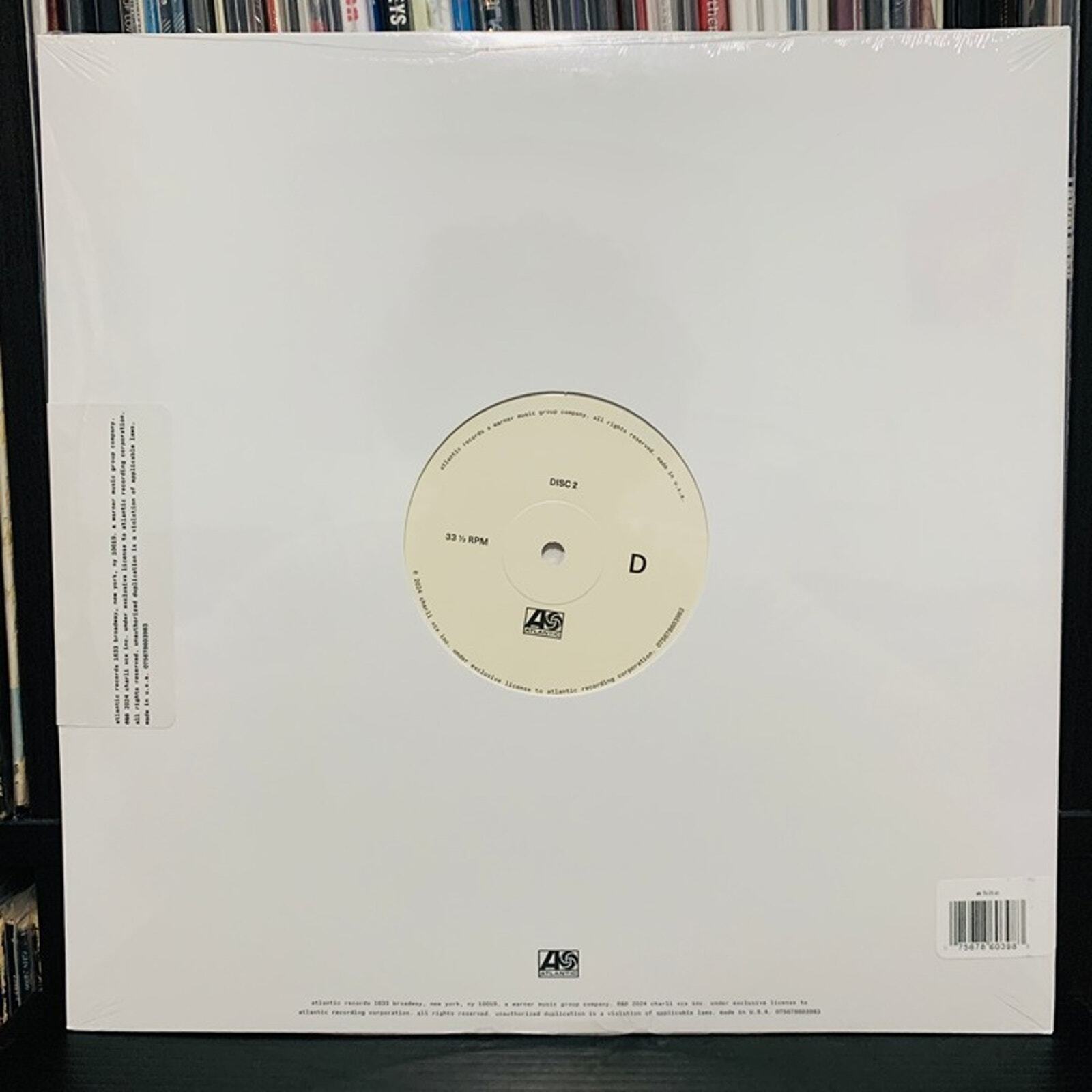 Charli XCX – Brat And It’s The Same But There’s Three More Songs… White Vinyl