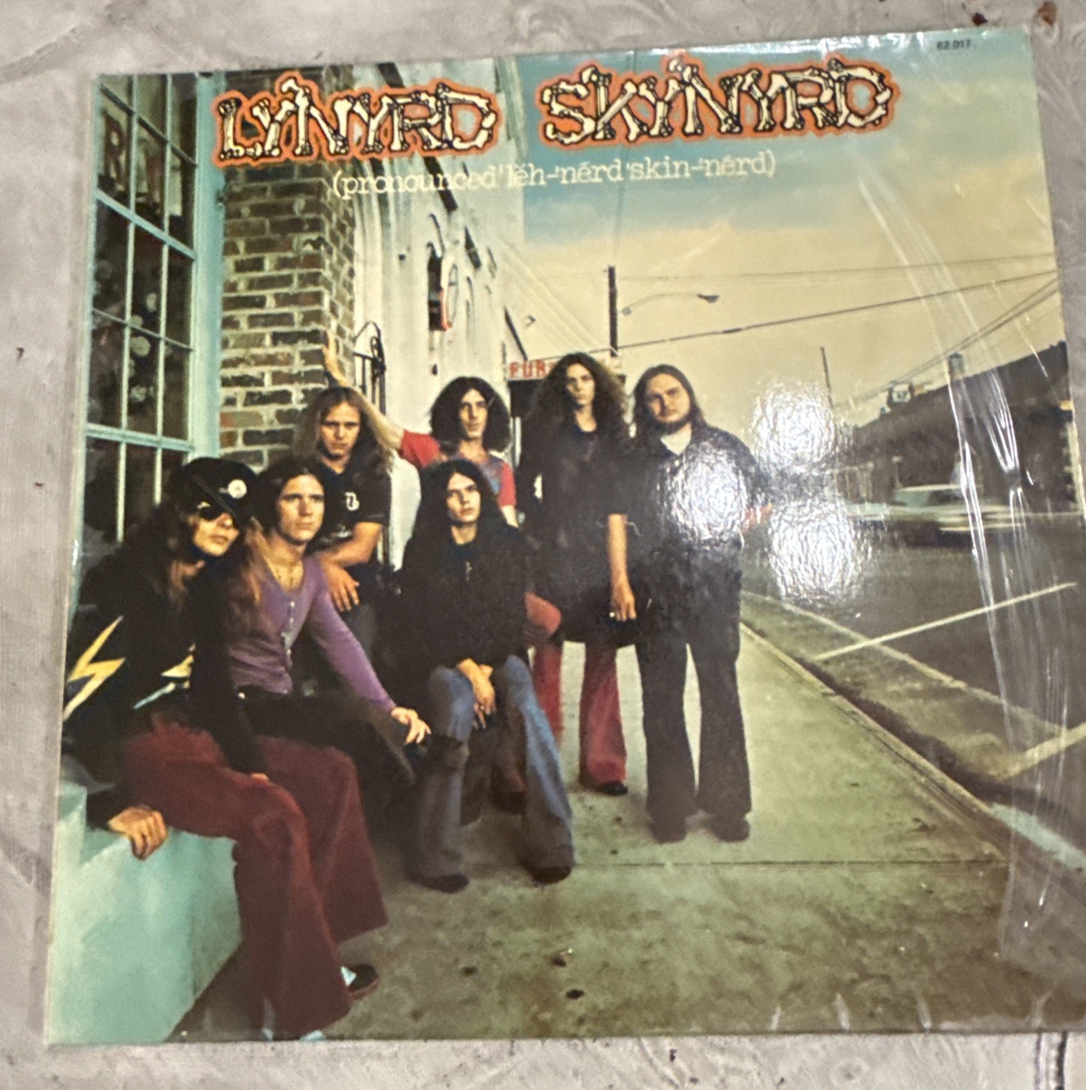 Lynyrd Skynyrd: (Pronounced ‘Lĕh-‘nérd ‘Skin-‘nérd) 12” Vinyl LP, German 62.017