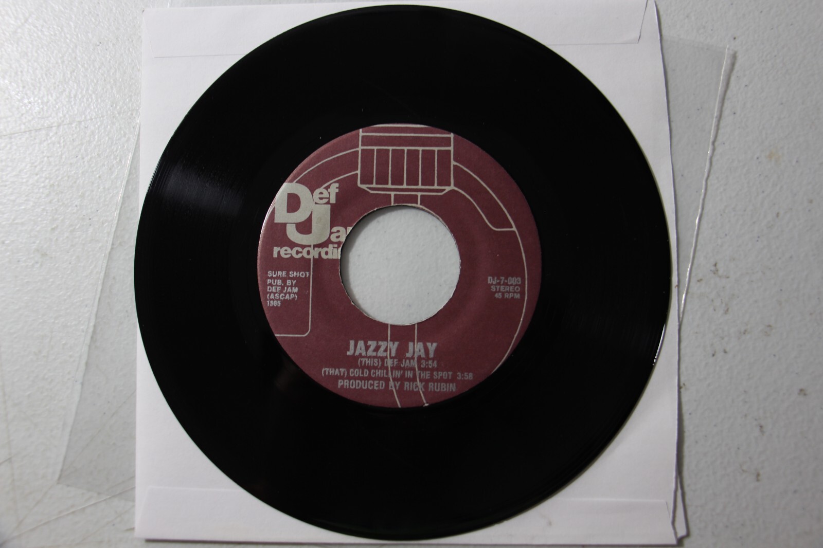 Jazzy Jay ‎– Def Jam / Cold Chillin’ In The Spot, 1985 7″ Def Jam DJ-7-003