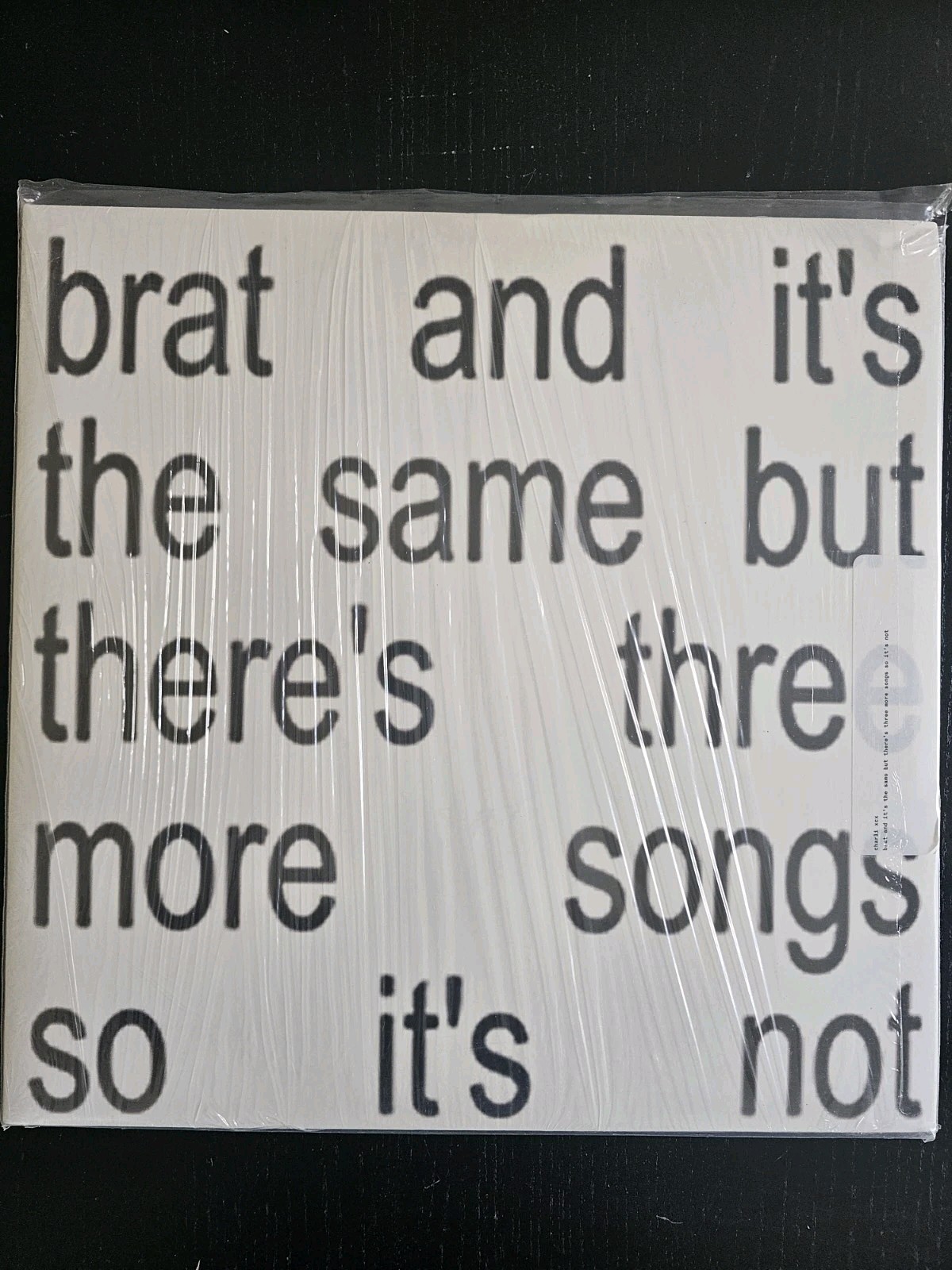 Brat and It’s the Same but There’s Three more Songs So It’s Not by Charli XCX…