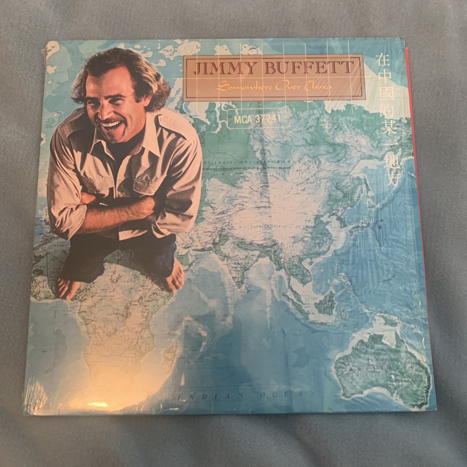 Jimmy Buffett – Somewhere Over China – 1981 MCA, VG+/VG