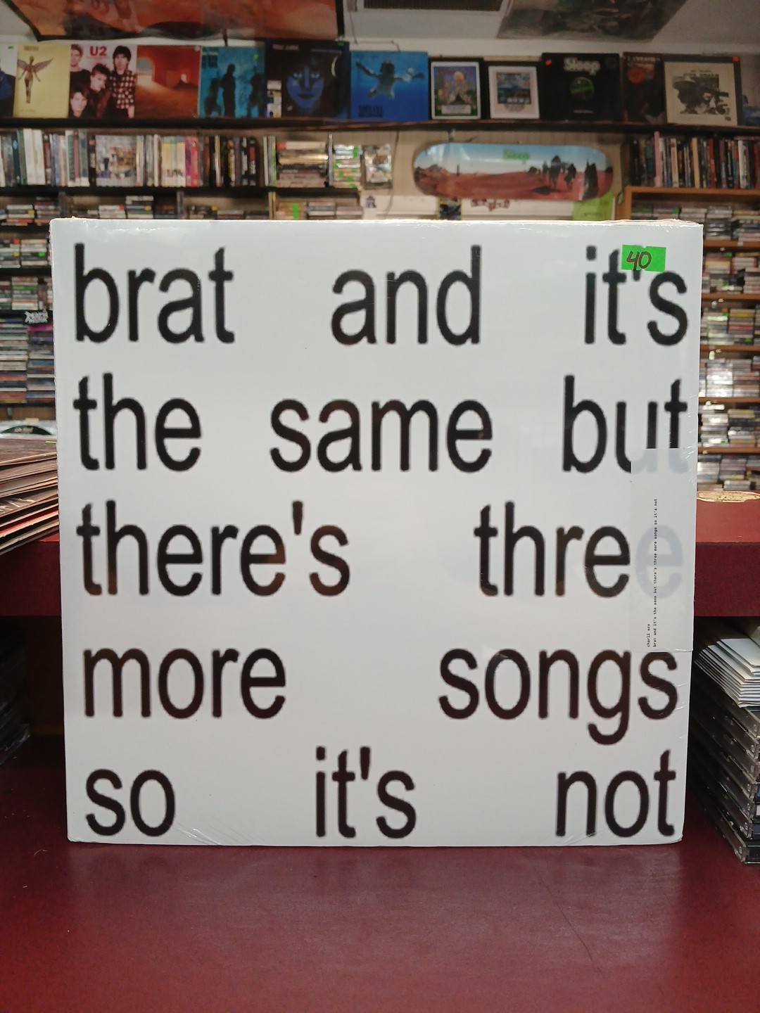 CHARLI XCX BRAT AND ITS THE SAME BUT THERES THREE MORE SONGS SO ITS NOT VINYL LP
