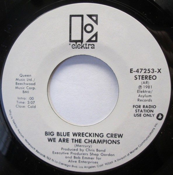 Big Blue Wrecking Crew – We Are The Champions (7″) (Near Mint (NM or M-)) – 4224