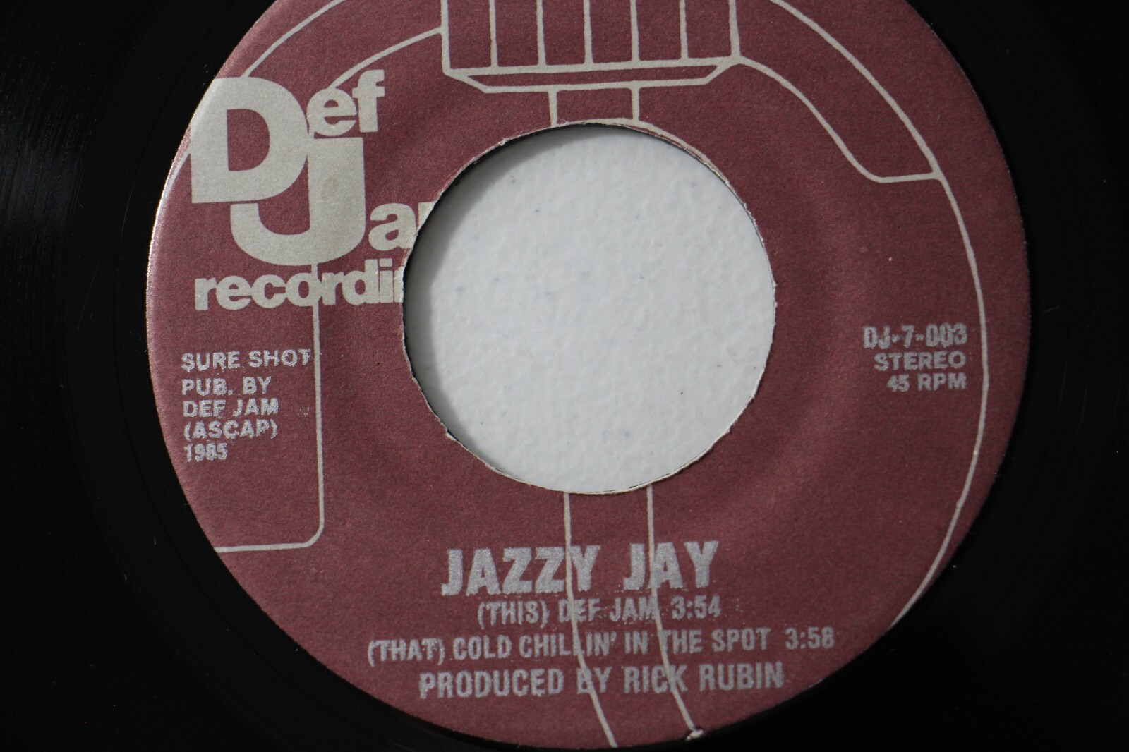 Jazzy Jay ‎– Def Jam / Cold Chillin’ In The Spot, 1985 7″ Def Jam DJ-7-003