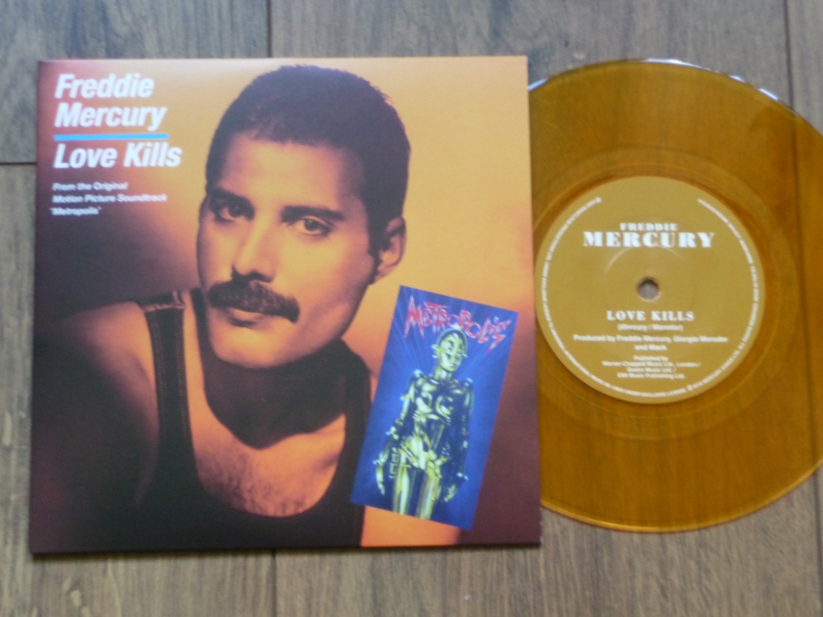 FREDDIE MERCURY – LOVE KILLS RE-ISSUE ONE-SIDED 7″ ORANGE VINYL NEW